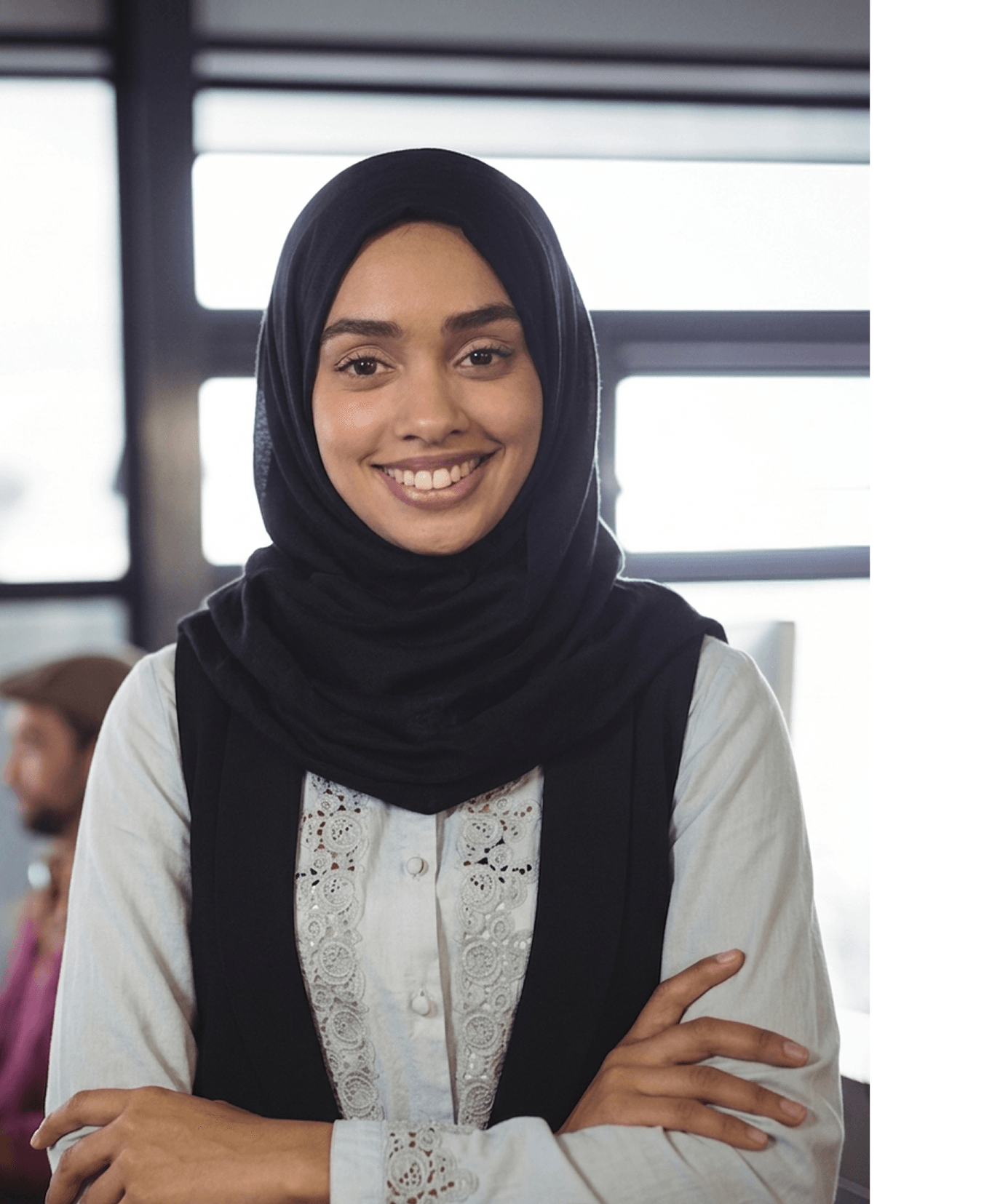 Professional smiling in workplace setting